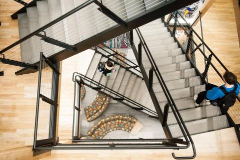 A view looking down upon the main staircase of the CLIC building at 574 Boston Avenue